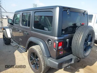2022 Jeep Wrangler Unlimited Sport S with VIN 1C4HJXDG5NW105931, listed as a IAAI auction lot 42349628 with 37,314 mi miles and . Bid and sale history available at DreamBid. Image 3.