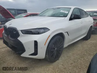 2025 BMW X6 M60i with VIN 5UX43EX07S9X98716, listed as a Copart auction lot 73753074 with 63 mi miles and Salvage Title. Bid and sale history available at carsss.com. Image 1.