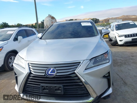 2018 Lexus RX 450hL Premium с VIN JTJDGKCA4J2001622, выставлен на аукционе IAAI как лот 42779010 с пробегом 71 969 миль миль и . История ставок и продаж доступна на DreamBid. Изображение 13.
