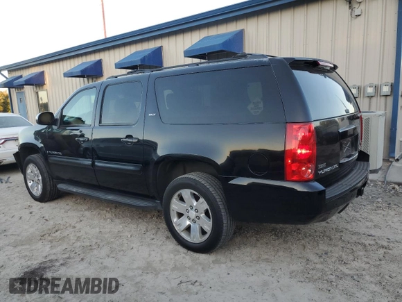 2008 GMC Yukon XL SLT with VIN 1GKFC160X8J187420, listed as a Copart auction lot 84614794 with 306,715 mi miles and Salvage Title. Bid and sale history available at carsss.com. Image 2.