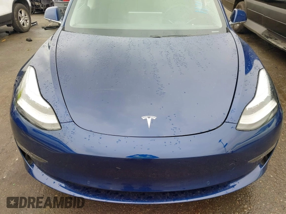 2020 Tesla Model 3 Standard Range Plus with VIN 5YJ3E1EAXLF644679, listed as a IAAI auction lot 41500595 with 53,726 mi miles and . Bid and sale history available at DreamBid. Image 10.