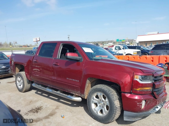 2016 Chevrolet Silverado 1500 LT with VIN 3GCUKREC0GG354271, listed as a IAAI auction lot 38948207 with 130,369 mi miles. Bid and sale history available at carsss.com. Image 13.