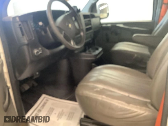 2014 Chevrolet Express Cargo Van with VIN 1GCSGAFXXE1154019, listed as a IAAI auction lot 41989495 with 303,623 mi miles. Bid and sale history available at carsss.com. Image 1.