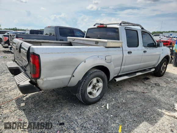 2002 Nissan Frontier XE with VIN 1N6ED29X82C340808, listed as a Copart auction lot 63927075 with 306,615 mi miles and Clean title. Bid and sale history available at DreamBid. Image 3.