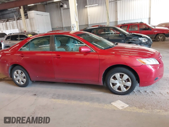 2007 Toyota Camry CE z VIN 4T4BE46K37R004090, wystawiony jako IAAI lot #42028376 z przebiegiem 110 803 mil mil oraz . Historia ofert i sprzedaży dostępna na DreamBid. Obrazek 14.