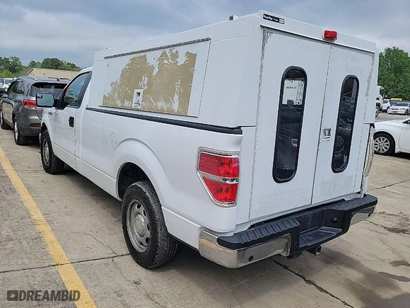 2014 Ford F-150 XL with VIN 1FTMF1CM5EKG22867, listed as a IAAI auction lot 42000275 with 200,657 mi miles. Bid and sale history available at carsss.com. Image 1.