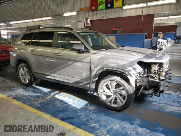 2022 Volkswagen Atlas SE with VIN 1V2LP2CAXNC564655, listed as a Copart auction lot 87390464 with 74,201 mi miles and Salvage title. Bid and sale history available at DreamBid. Image 4.