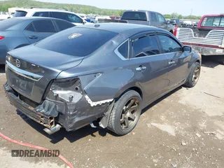 2015 Nissan Altima S with VIN 1N4AL3AP7FN359744, listed as a IAAI auction lot 41987153 with 196,855 mi miles and . Bid and sale history available at DreamBid. Image 4.