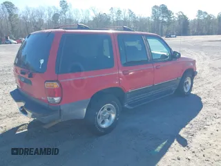 1999 Ford Explorer XLT z VIN 1FMZU32EXXZA25494, wystawiony jako IAAI lot #41659582 z przebiegiem 321 315 mil mil oraz . Historia ofert i sprzedaży dostępna na DreamBid. Obrazek 4.