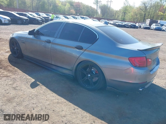 2011 BMW 5 Series 528i with VIN WBAFR1C51BC740751, listed as a IAAI auction lot 42143205 with 187,607 mi miles and . Bid and sale history available at carsss.com. Image 3.