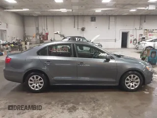 2014 Volkswagen Jetta TDI w/Premium with VIN 3VWLL7AJ4EM425825, listed as a IAAI auction lot 41519621 with 154,486 mi miles and . Bid and sale history available at DreamBid. Image 13.