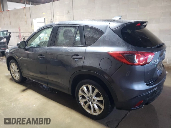 2015 Mazda CX-5 Grand Touring with VIN JM3KE4DY1F0454713, listed as a Copart auction lot 48548285 with 132,454 mi miles and Salvage Title. Bid and sale history available at DreamBid. Image 2.