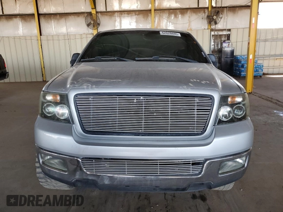 2005 Ford F-150 XLT with VIN 1FTPW12505KF07827, listed as a Copart auction lot 62026695 with Not provided miles and Salvage title. Bid and sale history available at DreamBid. Image 5.