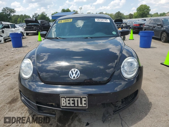 2015 Volkswagen Beetle Fleet Edition with VIN 3VWF17ATXFM645590, listed as a Copart auction lot 58234745 with 128,469 mi miles and Salvage title. Bid and sale history available at DreamBid. Image 5.