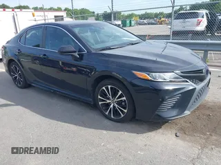 2019 Toyota Camry LE z VIN 4T1B11HK2KU281694, wystawiony jako IAAI lot #42289169 z przebiegiem 111 058 mil mil oraz . Historia ofert i sprzedaży dostępna na DreamBid. Obrazek 1.