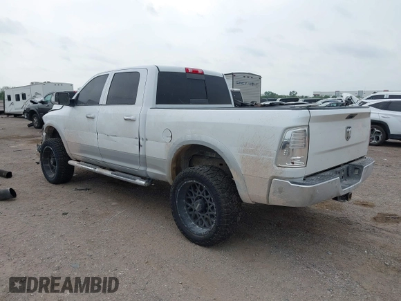 2016 Ram 2500 Laramie with VIN 3C6UR5FLXGG330005, listed as a IAAI auction lot 42045277 with 210,480 mi miles and . Bid and sale history available at DreamBid. Image 3.