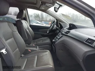 2013 Honda Odyssey Touring with VIN 5FNRL5H97DB021403, listed as a IAAI auction lot 41606606 with 223,547 mi miles. Bid and sale history available at carsss.com. Image 5.