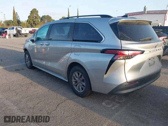 2021 Toyota Sienna XLE with VIN 5TDYRKEC2MS074448, listed as a IAAI auction lot 41946030 with 122,509 mi miles and . Bid and sale history available at DreamBid. Image 3.