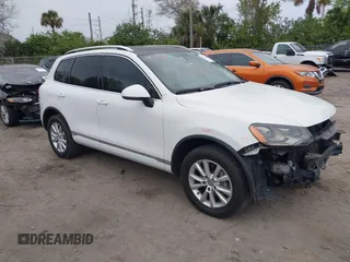 2013 Volkswagen Touareg Exec с VIN WVGEF9BP6DD004373, выставлен на аукционе IAAI как лот 41615201 с пробегом 159 381 миль миль и . История ставок и продаж доступна на DreamBid. Изображение 1.