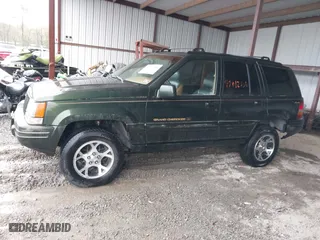 1997 Jeep Grand Cherokee Limited with VIN 1J4GZ78Y5VC723429, listed as a IAAI auction lot 42012836 with 231,126 mi miles. Bid and sale history available at carsss.com. Image 14.