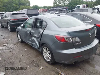 2012 Mazda 3 i Grand Touring with VIN JM1BL1W87C1662837, listed as a IAAI auction lot 42591473 with 76,516 mi miles and . Bid and sale history available at DreamBid. Image 3.