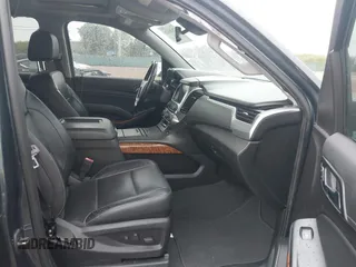 2020 Chevrolet Suburban Premier with VIN 1GNSCJKC8LR290783, listed as a IAAI auction lot 42636126 with 59,371 mi miles and . Bid and sale history available at DreamBid. Image 5.