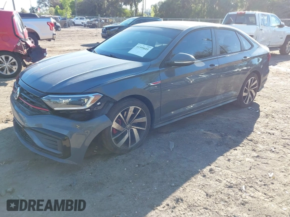 2019 Volkswagen Jetta GLI S z VIN 3VW6T7BU5KM169132, wystawiony jako IAAI lot #41599605 z przebiegiem 59 744 mil mil oraz . Historia ofert i sprzedaży dostępna na DreamBid. Obrazek 17.