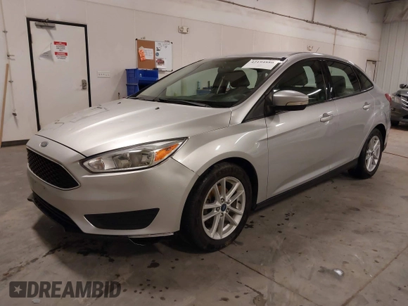 2017 Ford Focus SE z VIN 1FADP3F20HL245291, wystawiony jako IAAI lot #42194880 z przebiegiem 93 764 mil mil oraz . Historia ofert i sprzedaży dostępna na DreamBid. Obrazek 17.