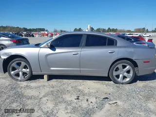 2014 Dodge Charger SXT with VIN 2C3CDXHG6EH166994, listed as a IAAI auction lot 41801739 with 163,314 mi miles. Bid and sale history available at carsss.com. Image 14.