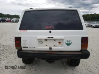 1992 Jeep Cherokee SE with VIN 1J4FJ28S1NL154354, listed as a Copart auction lot 71081634 with 0 mi miles and Salvage Title. Bid and sale history available at carsss.com. Image 6.