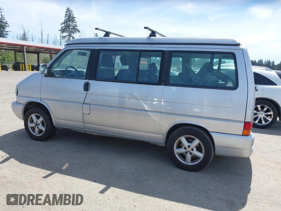 2003 Volkswagen EuroVan MV with VIN WV2NB47003H003131, listed as a IAAI auction lot 42157821 with 166,159 mi miles and . Bid and sale history available at DreamBid. Image 14.