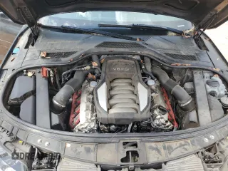 2011 Audi A8 z VIN WAURVAFD9BN013776, wystawiony jako Copart lot #51989675 z przebiegiem 148 822 mil mil oraz Szkody całkowita. Historia ofert i sprzedaży dostępna na DreamBid. Obrazek 11.