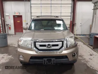 2011 Honda Pilot Touring with VIN 5FNYF4H92BB053458, listed as a IAAI auction lot 41594708 with 136,454 mi miles. Bid and sale history available at carsss.com. Image 13.