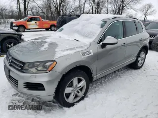2011 Volkswagen Touareg с VIN WVGFG9BP9BD001966, выставлен на аукционе Copart как лот 88295285 с пробегом 120 449 миль миль и Чистый • Clean title. История ставок и продаж доступна на DreamBid. Изображение 1.
