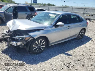 2023 Honda Civic EX z VIN 2HGFE1F75PH312215, wystawiony jako Copart lot #57892525 z przebiegiem 52 860 mil mil oraz Szkoda całkowita • Salvage title. Historia ofert i sprzedaży dostępna na DreamBid. Obrazek 1.