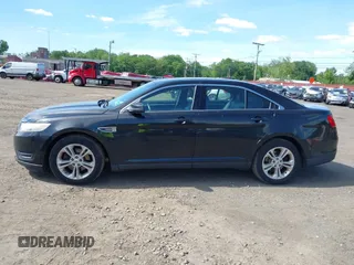 2015 Ford Taurus SEL with VIN 1FAHP2E88FG181055, listed as a IAAI auction lot 42307640 with 104,702 mi miles and . Bid and sale history available at DreamBid. Image 13.