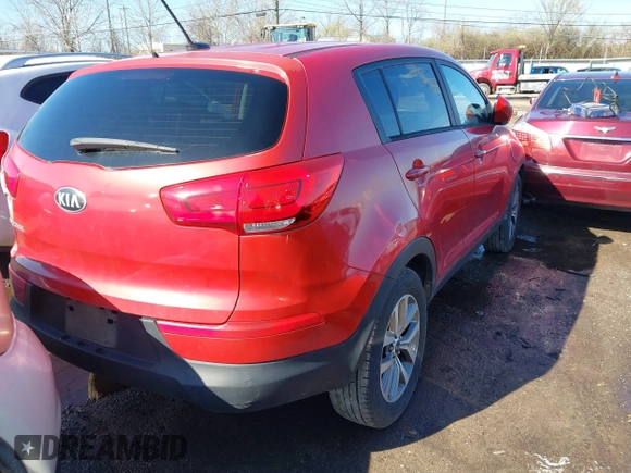2015 Kia Sportage LX with VIN KNDPBCAC6F7701564, listed as a IAAI auction lot 41872684 with 162,945 mi miles and . Bid and sale history available at DreamBid. Image 4.