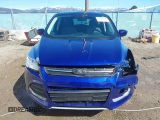 2014 Ford Escape SE with VIN 1FMCU9G99EUD02098, listed as a IAAI auction lot 41814969 with 210,218 mi miles and . Bid and sale history available at DreamBid. Image 13.