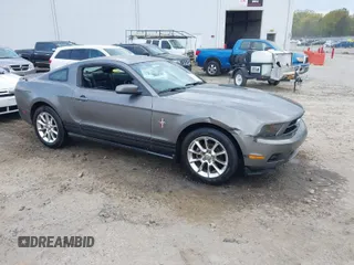 2010 Ford Mustang V6 with VIN 1ZVBP8AN7A5165591, listed as a IAAI auction lot 41940551 with 235,079 mi miles. Bid and sale history available at carsss.com. Image 1.