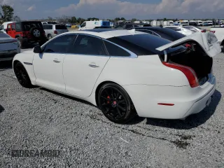 2015 Jaguar XJ with VIN SAJWA1CZ8F8V81637, listed as a Copart auction lot 55619555 with 88,328 mi miles and Salvage Title. Bid and sale history available at DreamBid. Image 2.