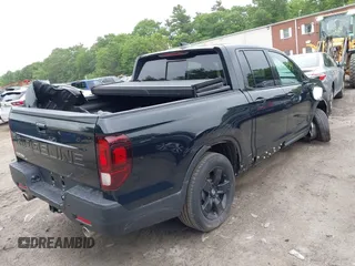 2024 Honda Ridgeline Black Edition with VIN 5FPYK3F83RB012452, listed as a IAAI auction lot 42422754 with 26,475 mi miles and . Bid and sale history available at DreamBid. Image 4.