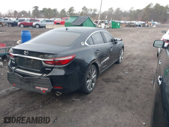 2019 Mazda 6 Grand Touring Reserve with VIN JM1GL1WY6K1505935, listed as a IAAI auction lot 41626078 with 19,000 mi miles and . Bid and sale history available at DreamBid. Image 4.