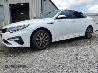 2019 Kia Optima LX with VIN 5XXGT4L35KG323142, listed as a Copart auction lot 64058525 with 84,514 mi miles and Clean title. Bid and sale history available at DreamBid. Image 1.