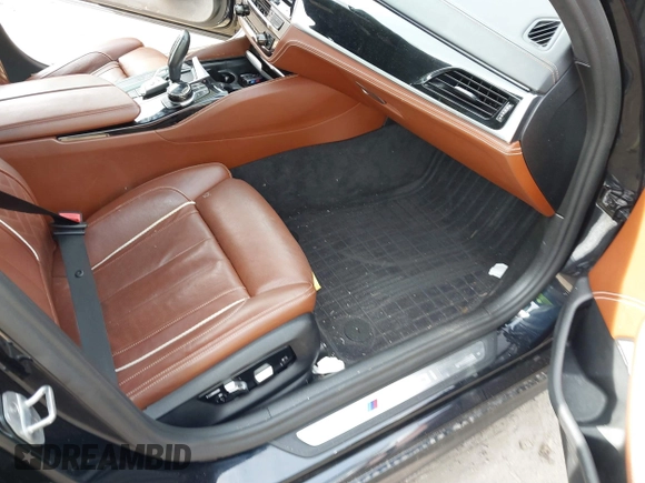 2018 BMW 5 Series M550i xDrive with VIN WBAJB9C50JB036400, listed as a IAAI auction lot 41464278 with 139,079 mi miles and . Bid and sale history available at DreamBid. Image 5.