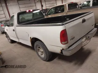 2000 Ford F-150 XL with VIN 1FTRF17W8YKB33949, listed as a IAAI auction lot 41519978 with 228,931 mi miles. Bid and sale history available at carsss.com. Image 3.