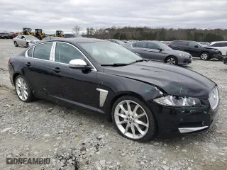 2013 Jaguar XF V8 Supercharged RWD with VIN SAJWA0HE3DMS83159, listed as a Copart auction lot 87364194 with 49,436 mi miles and Salvage Title. Bid and sale history available at carsss.com. Image 4.