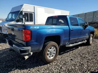 2015 Chevrolet Silverado 3500HD LTZ with VIN 1GC4K0E80FF577143, listed as a Copart auction lot 76626244 with 41,587 mi miles and Salvage Title. Bid and sale history available at carsss.com. Image 3.