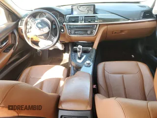 2012 BMW 3 Series 328i with VIN WBA3A5C58CF348710, listed as a Copart auction lot 61266815 with 112,720 mi miles and Salvage title. Bid and sale history available at DreamBid. Image 8.