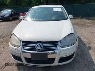 2007 Volkswagen Jetta 2.5 z VIN 3VWRG71K77M062978, wystawiony jako IAAI lot #42415517 z przebiegiem 168 159 mil mil oraz . Historia ofert i sprzedaży dostępna na DreamBid. Obrazek 6.