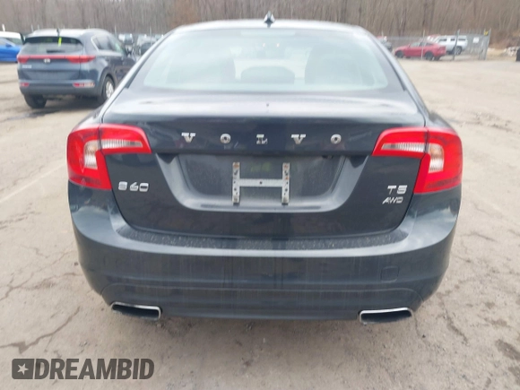 2015 Volvo S60 T5 Platinum with VIN YV1612TDXF1317203, listed as a IAAI auction lot 41715131 with 142,632 mi miles. Bid and sale history available at carsss.com. Image 16.